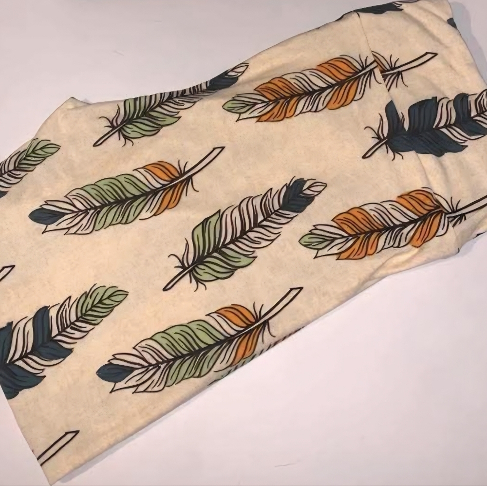 New LulaRoe Leggings Feather Print Cream Leggings with Green, Orange & Teal